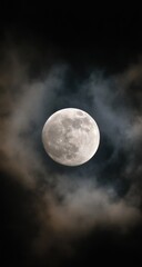 Full moon partially obscured by dark clouds