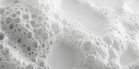 White bubbles on water's surface.