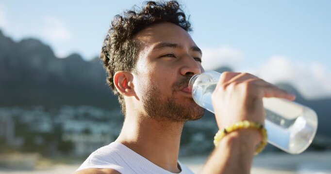 Fitness, outdoor or happy man drink water from bottle, restore lost body fluid or electrolytes balance. Thirsty, liquid or healthy person with hydration for muscle recovery, nature or exercise break