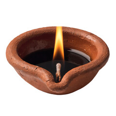 Traditional clay diya lamp with warm flame on black background