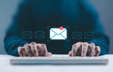 Person typing on keyboard with email notification icon, digital communication and inbox alert concept, online messaging, cybersecurity and business technology background for email marketing