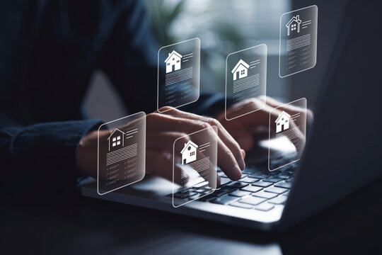 Person using a laptop with holographic house icons, symbolizing online real estate search, property management, or digital home listings. - Powered by Adobe