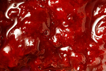 Raspberry jam as an abstract background. Close-up © schankz