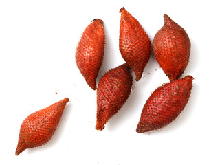 A bunch of red fruits with a white background