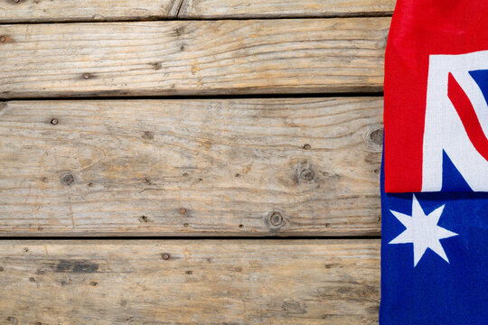 Directly above view of australia flag on wooden table with copy space