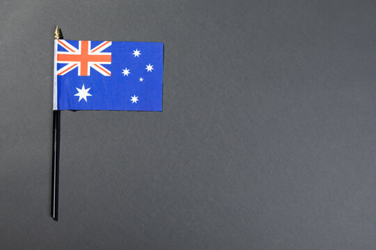 Overhead view of australia flag isolated on gray background with copy space