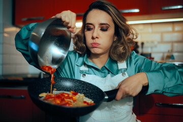 Busy Exhausted Housewife Pours Vegetable Omelet into Pan. Funny woman trying to hurry to prepare breakfast in the morning 