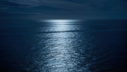 Fototapeta premium Ocean at night reflecting moonlight peaceful water surface concept