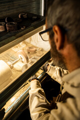 Metal Polish Machine in Operation at a Workshop During Evening Hours