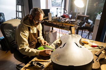 Crafting Carbon Fiber Cello Parts in a Moody Luthier Workshop
