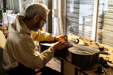 Crafting a Carbon Fiber Cello in a Luthier Workshop