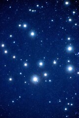 Fototapeta premium Celestial Radiance: Starry Night Sky with Glowing Luminaries