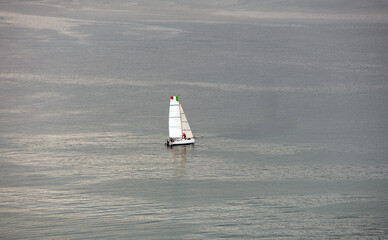 sailboat off Naples at dawn