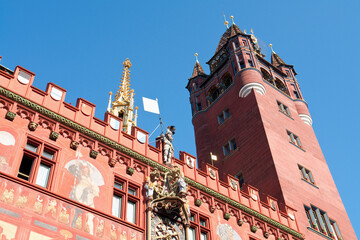 Historic city hall building and tower in Basel Switzerland on a sunny day