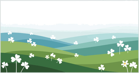 Fototapeta premium Serene landscape with white flowers blooming in the rolling hills and green fields under a clear sky