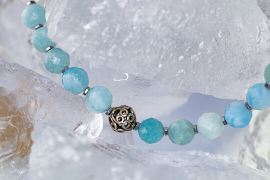 Luxury Gemstone Necklace on Transparent Ice Cubes