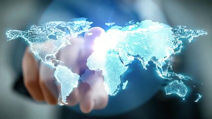 Global Business Network: A businessman uses interactive world map interface to illustrate international connections.