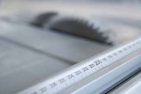 Close up of buzz saw and measuring scale in carpentry workshop in Schaeftlarn