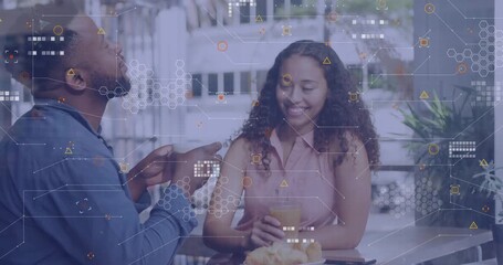 Smiling couple enjoying drinks at cafe with digital data overlay animation - Powered by Adobe