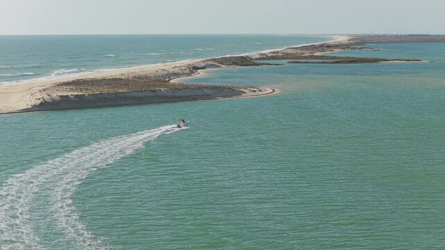 Aerial view of Fuseta beach sandbar in Algarve Portugal