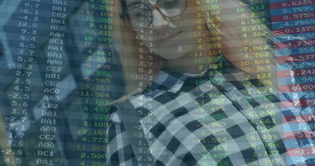 Female office professional raising smartphone in corridor, reviewing translucent finance data - Powered by Adobe