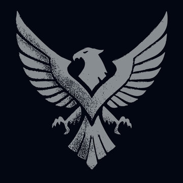 Stylized grey eagle or phoenix illustration with outstretched wings and distressed grunge texture on dark background, symbolizing power, freedom, and strength.