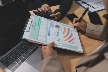 Accounting company provide finance and taxation planning for profitable cash flow, Auditor and accountant team working in office, analyze financial data and accounting record with calculator.Insight