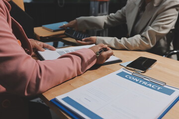 Consultation and conference of professional businesswoman and Male lawyers working and discussion having at law firm in office. Concepts of law, Judge gavel with scales of justice