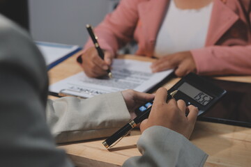 Consultation and conference of professional businesswoman and Male lawyers working and discussion having at law firm in office. Concepts of law, Judge gavel with scales of justice