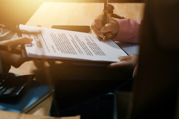 Consultation and conference of professional businesswoman and Male lawyers working and discussion having at law firm in office. Concepts of law, Judge gavel with scales of justice