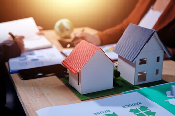 Asian woman lead young group of multiethnic businesspeople in team meeting, using laptop computer for ESG topic presentation on monitor. Sustainable business practice, people work at home concept