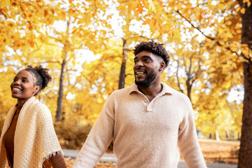  Couple Holding Hands in Autumn Park