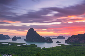Long exposure of Vibrant Sunrise Over Majestic Karst Islands at Samet Nang Chee viewpoint in Phang Nga Bay, Phang Nga province, Southern of Thailand 