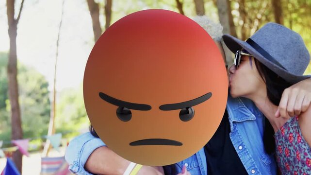 Angry emoji animation over friends enjoying outdoor gathering in park