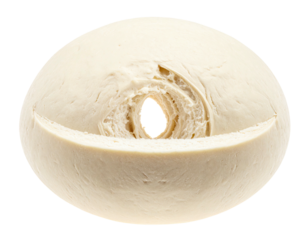 Close-up of a rounded dough mass with a distinctive textured crevice