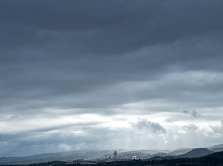 Dramatic Clouds Over Industrial Landscape Panorama
