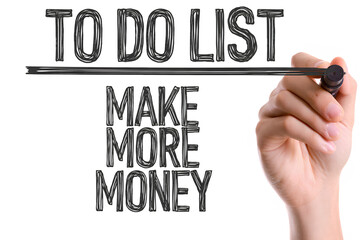 To Do List With Make More Money Goal Written by Hand on White Background
