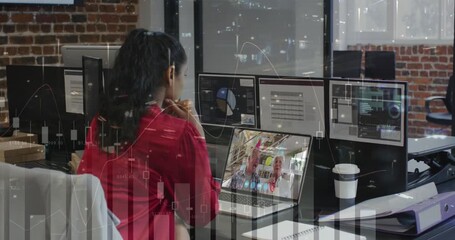 Animation of financial data processing over businesswoman using laptop - Powered by Adobe