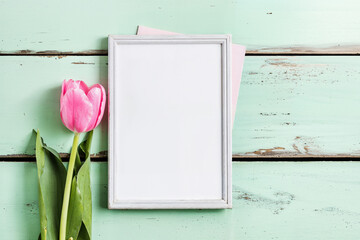 Mockup for Mother's Day greeting with blank template and flower