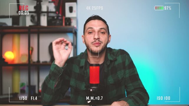 Podcast Host Speaking Confidently into Microphone