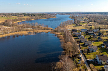 Beautiful view of Valdemarpils, Latvia with river and houses on a sunny day