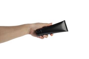 Black cosmetic product or sunscreen cosmetic with hand on transparent background.