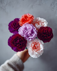 Colorful bouquet of carnations home setting floral photography indoor environment close-up view artful arrangement