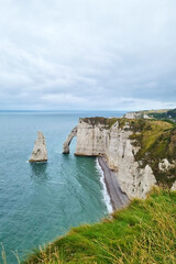 Scenic Coastal View of Cliffs and Sea Stacks at Etretat in Normandy for Travel and Nature Photography