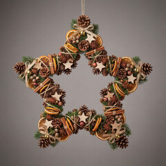 Christmas star wreath made of natural decorations and pinecones  