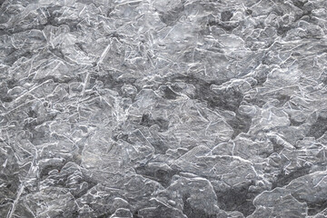 Frozen mountain stream in winter