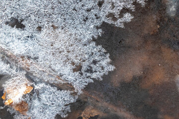 Frozen mountain stream in winter