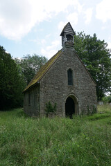 old stone church in rural village. hidden gem amongst the trees. religious building