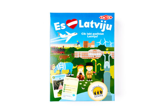 Valmiera, Latvia - December 09, 2025: Colorful board game box titled "Es milu Latviju" featuring illustrations of Latvia's landmarks and activities