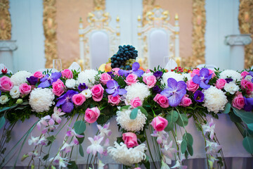Elegant Floral Arrangement with Pink Roses and Purple Orchids